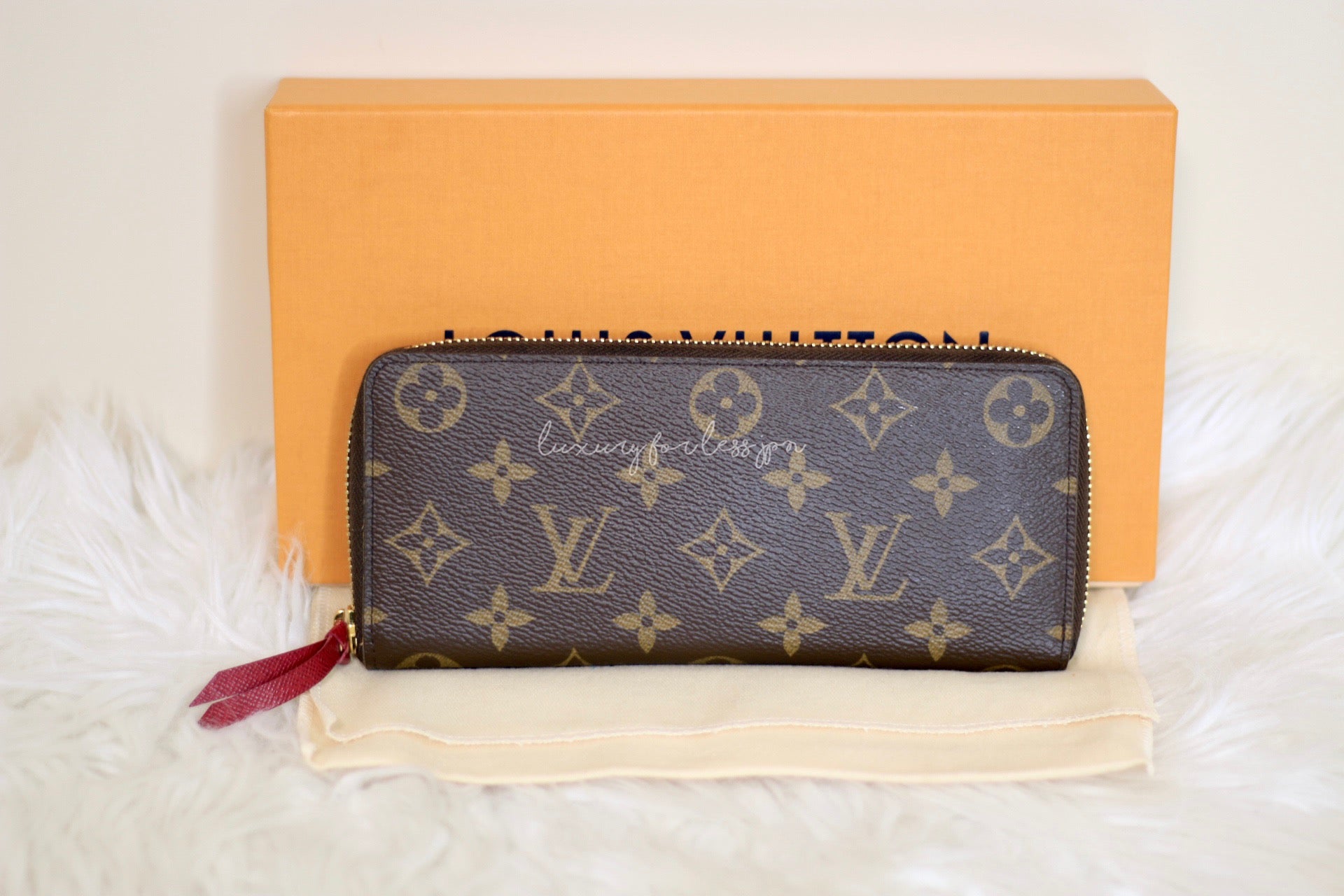 LOUIS VUITTON KEY POUCH IN ORANGE PERFORATED MONOGRAM CANVAS KEY