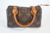 Louis Vuitton Monogram Mini Speedy HL w/ strap Used