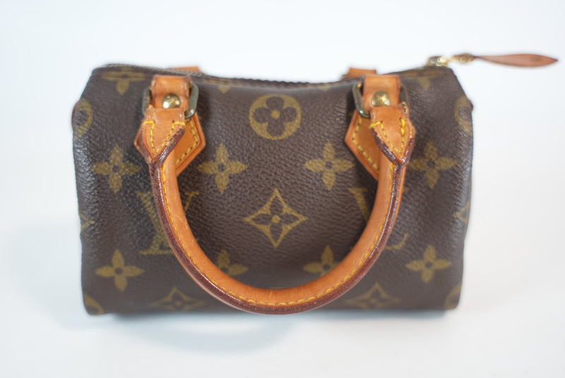 Louis Vuitton Monogram Mini Speedy HL w/ strap Used