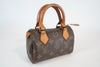 Louis Vuitton Monogram Mini Speedy HL w/ strap Used