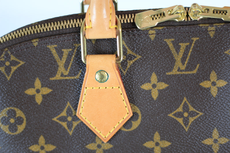 Louis Vuitton Monogram Alma PM Handbag Used