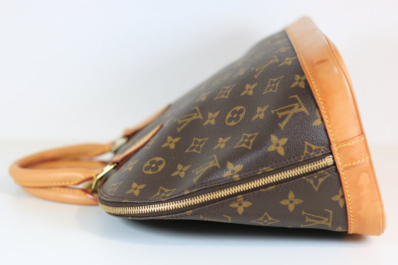 Louis Vuitton Monogram Alma PM Handbag Used