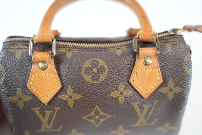 Louis Vuitton Monogram Mini Speedy HL w/ strap Used