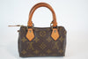 Louis Vuitton Monogram Mini Speedy HL w/ strap Used
