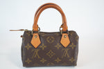 Louis Vuitton Monogram Mini Speedy HL w/ strap Used