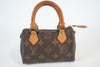 Louis Vuitton Monogram Mini Speedy HL w/ strap Used
