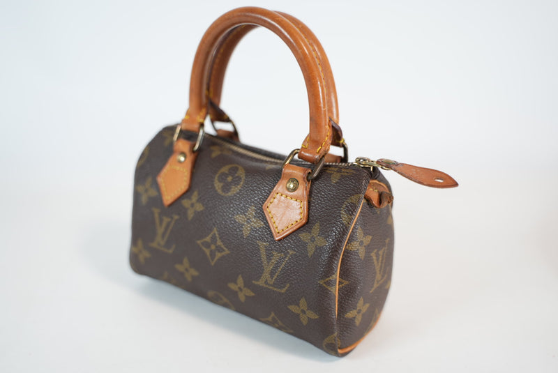 Louis Vuitton Monogram Mini Speedy HL w/ strap Used