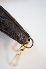 Limited Edition Louis Vuitton Monogram Mini Pochette Christmas Animation Tokyo Unused