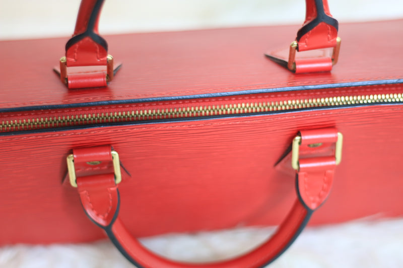 Louis Vuitton EPI Triangle Sac Leather Handbag