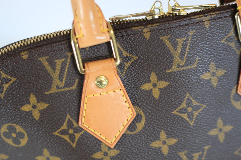 Louis Vuitton Monogram Alma PM Handbag Used