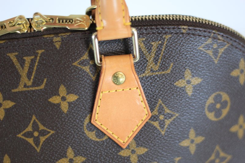 Louis Vuitton Monogram Alma PM Handbag Used