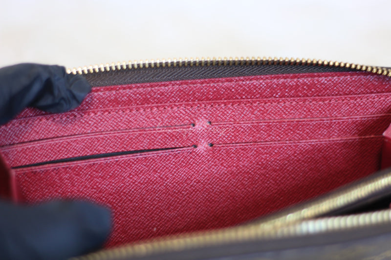 Louis Vuitton monogram Clemence wallet with fuchsia interior